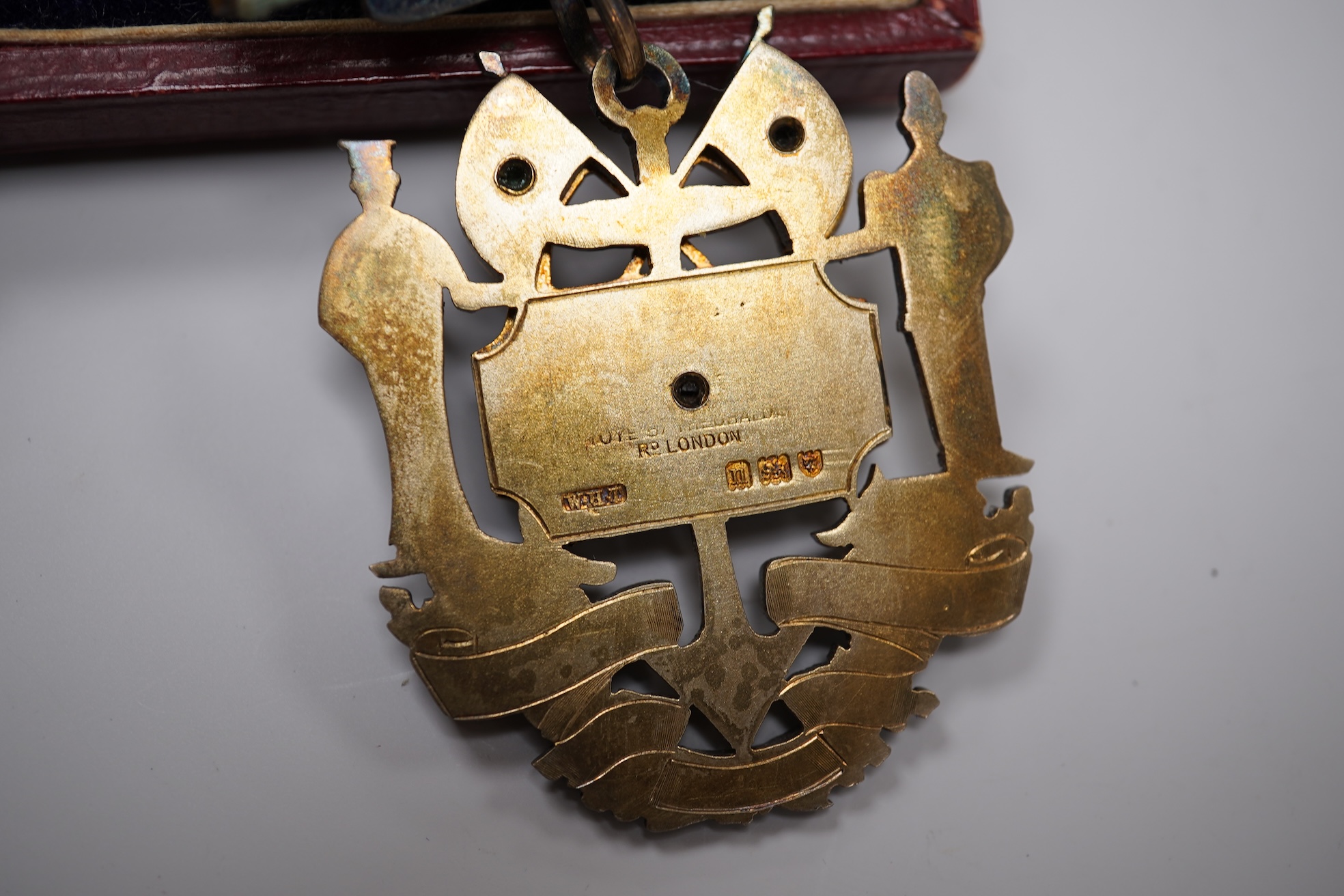 Three Masonic interest medallions / medals, each with enamelled decoration to include a silver gilt example for the Royal Naval Lodge, each cased
